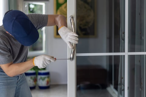 Worker installing door handle